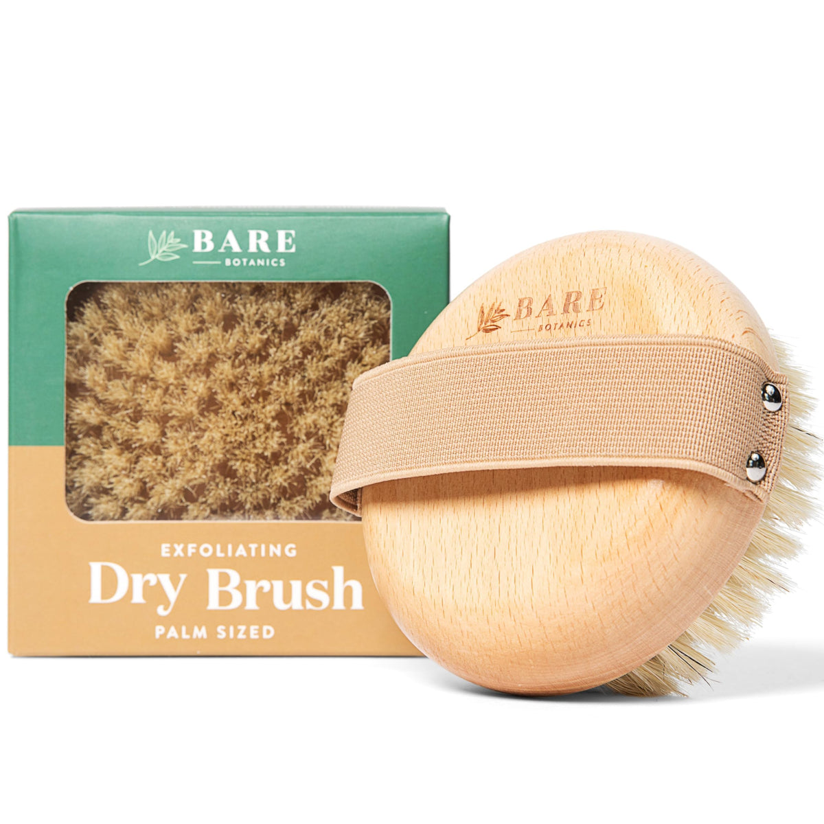 Brosse Bare Botanics pour le corps sèche, tenue en paume, exfoliation en douceur.