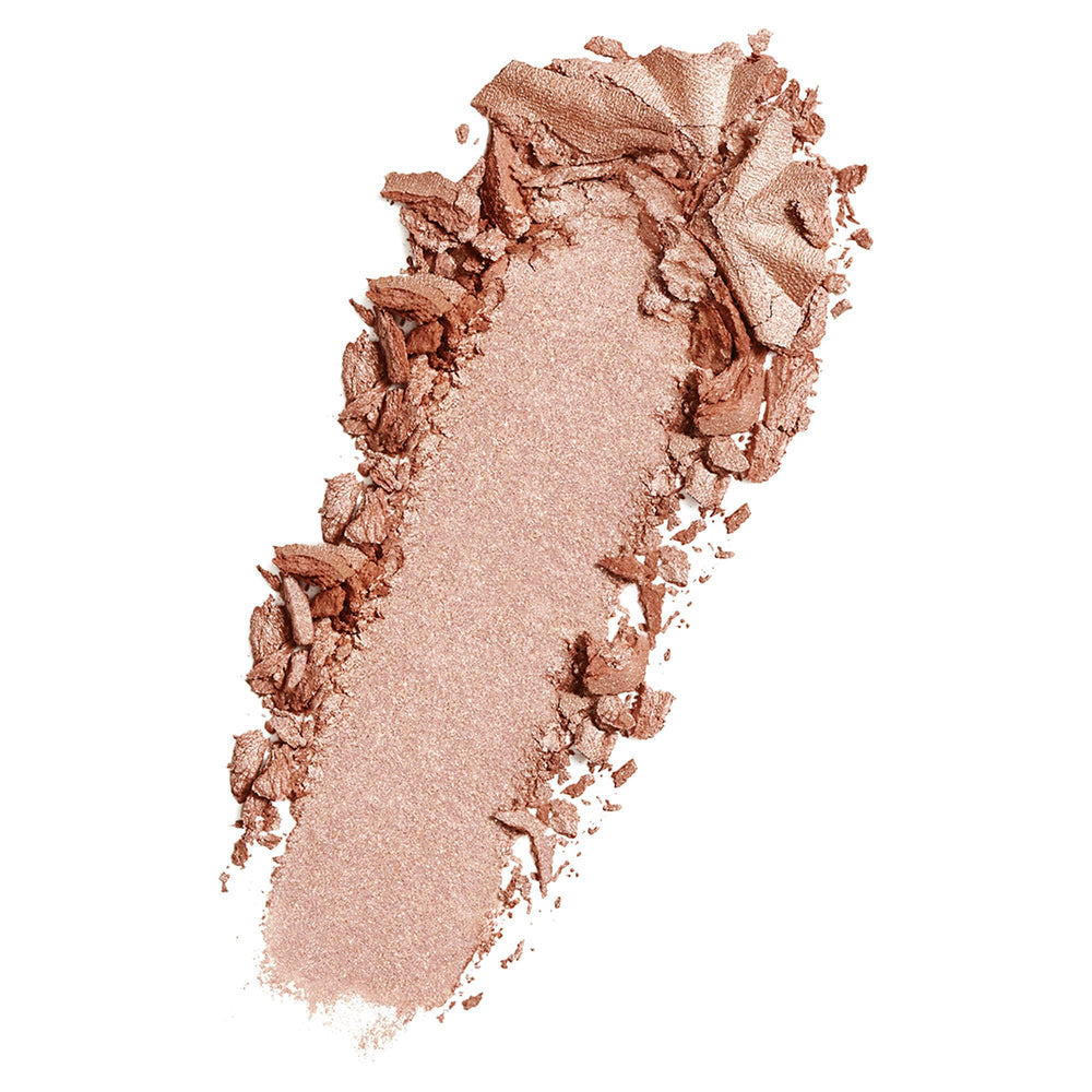 Texture poudre finement moulue Opal Glow pour un fini léger et lumineux.