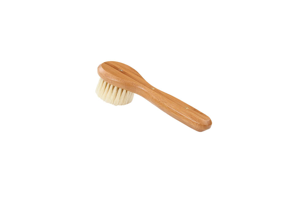 Brosse Bass nettoyant le visage, pores et peau tonifiée après lavage.