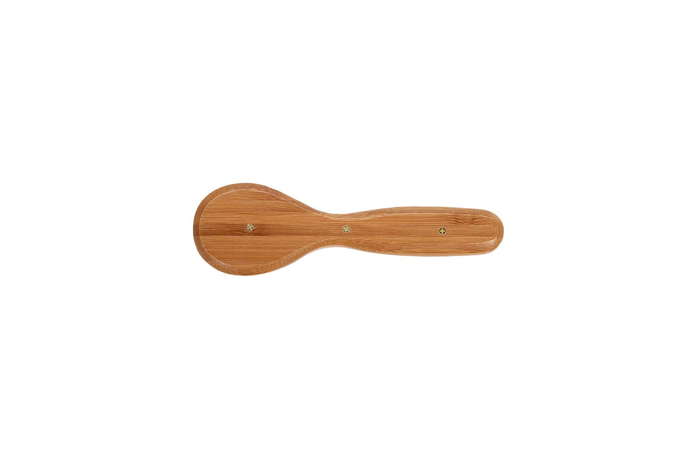 Brosse Bass destinée au voyage, format portable et pratique.