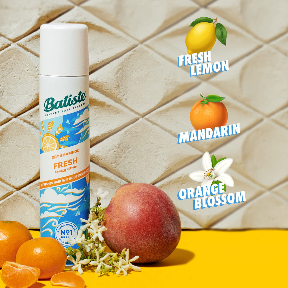 Batiste Shampoing sec frais, massage soigné pour ajouter du volume.