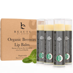 Baume à lèvres Beauty by Earth dans son emballage, soin biologique prêt à l'emploi.