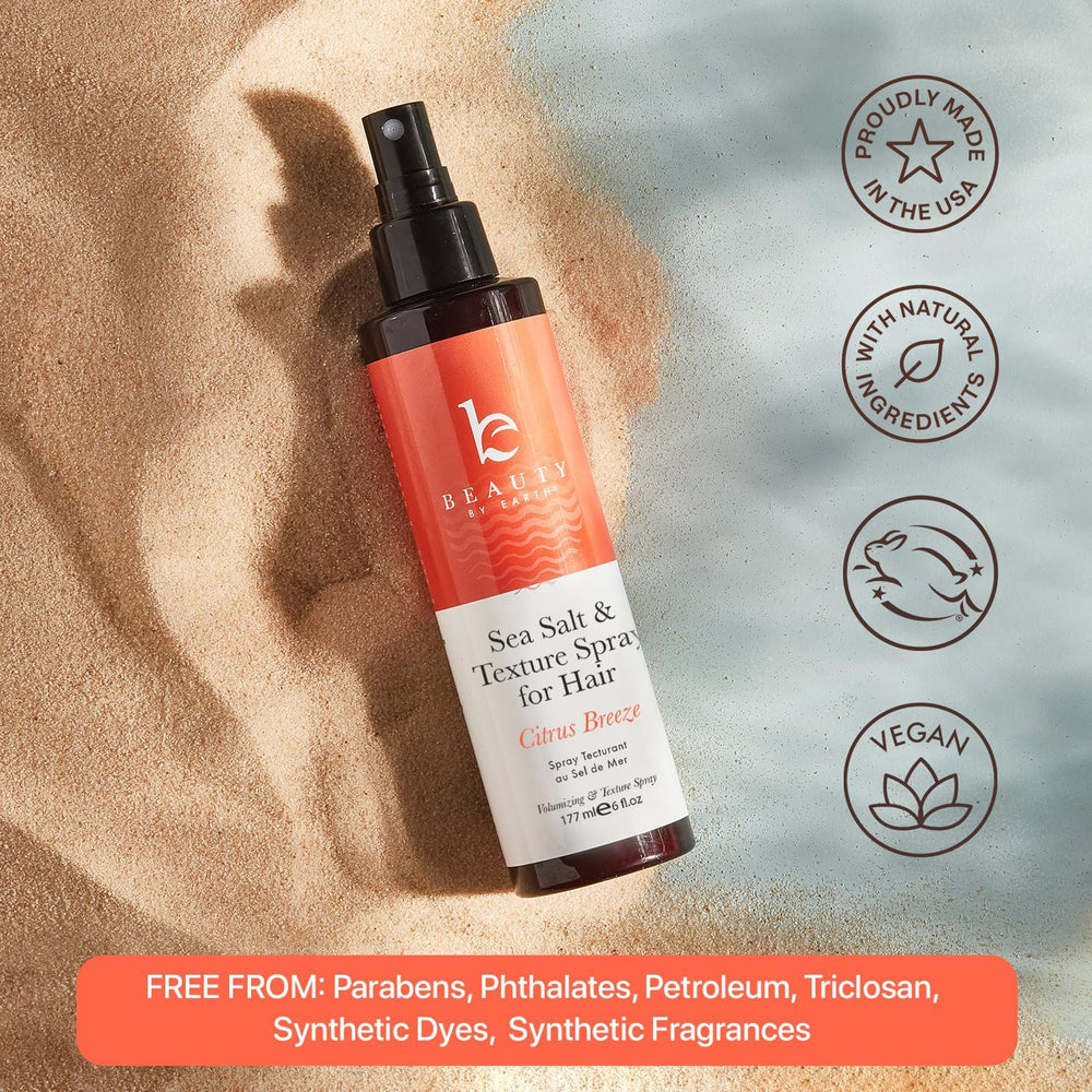 Beauty by Earth Sea Salt Spray user applying for textured look