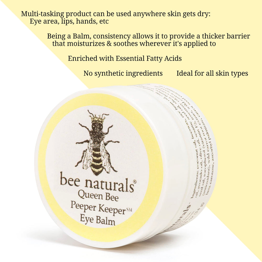 Application shot of Bee Naturals eye balm, creamy texture glides under the eyes.