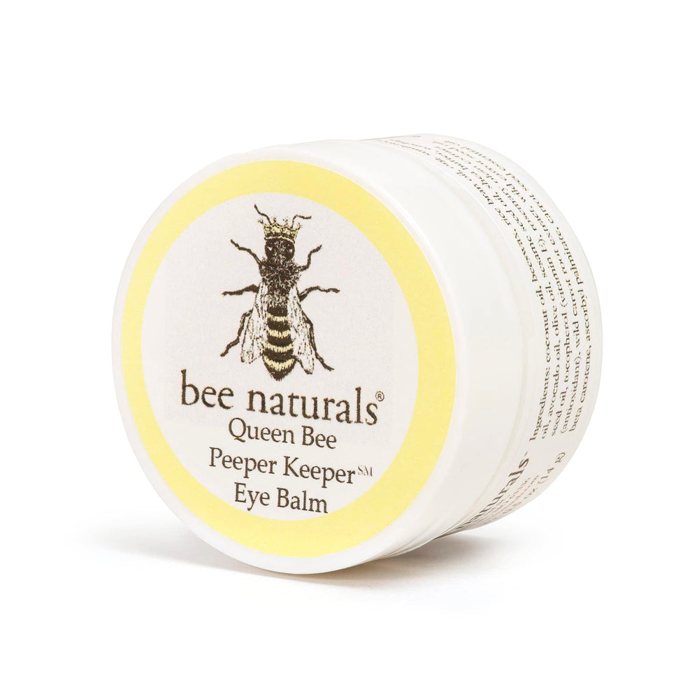 Bee Naturals Peeper Keeper Eye Balm packaging, portable for on-the-go hydration.
