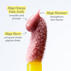 Beekman 1802 Oh Mega Milk Lip Oil, application facile pour une hydratation durable.