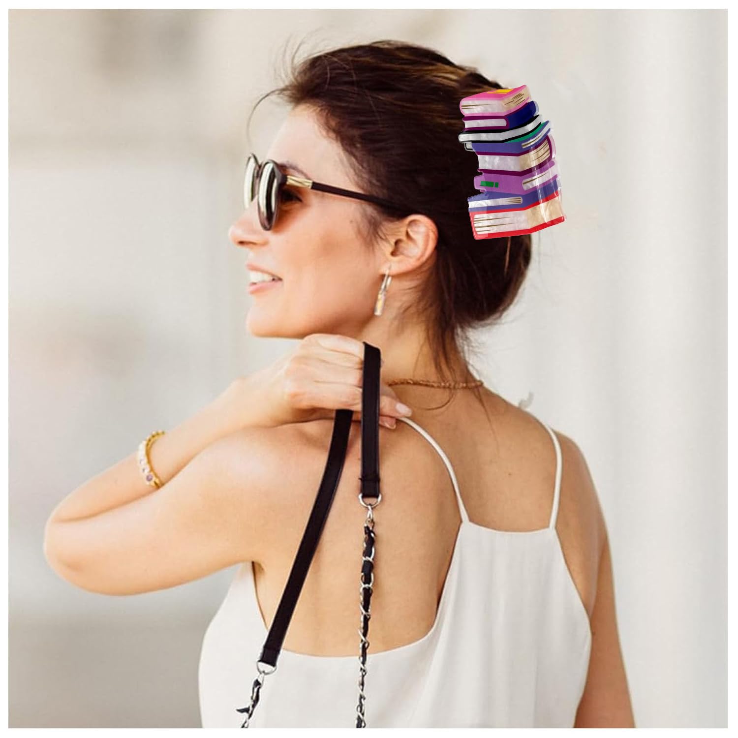 Accessoire BESALECK livre orange, look ludique et tendance pour tous les jours.