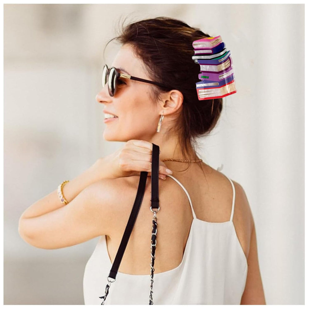 Accessoire BESALECK livre orange, look ludique et tendance pour tous les jours.