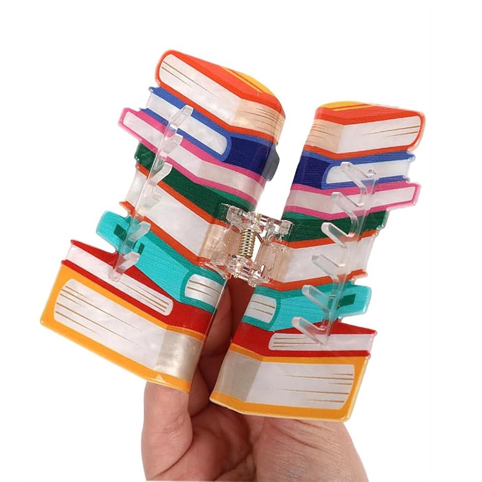 Accessoire BESALECK livre rose, parfait pour étudiants et enseignantes.