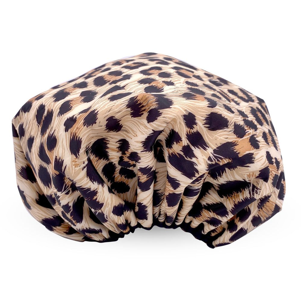 Betty Dain Socialite Safari Spots, cap réversible, doublure terry absorbe l'humidité.