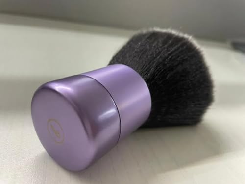 BevyGold pinceau poudre doux diffusion naturelle pour un teint fluide.