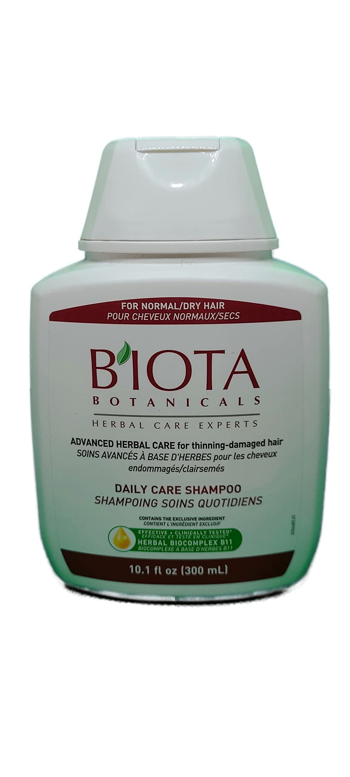 Biota Shampoing Quotidien: bouteille qui verse, soin doux pour cheveux normaux et secs.