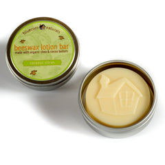 Barre hydratante Bluecorn Beeswax coco-citron pour peau nourrie et souple.