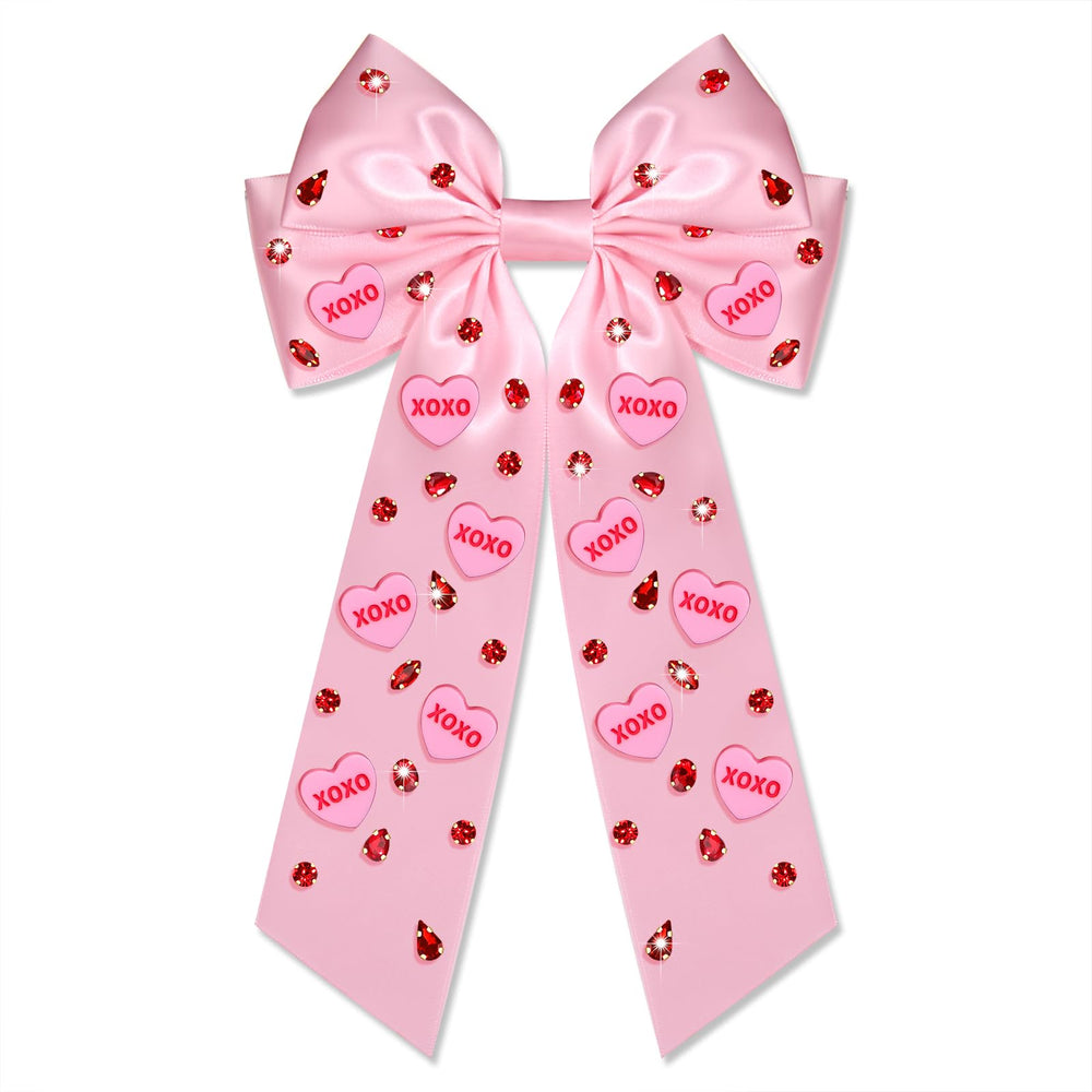 Noeud Boderier satin rose avec coeur XOXO et paillettes, pour un look romantique.