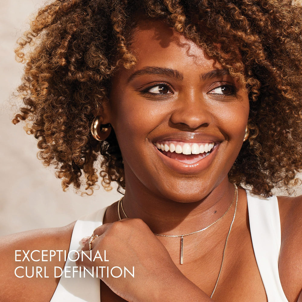 Coiffage rapide et efficace pour boucles bien définies avec Curl Boss.