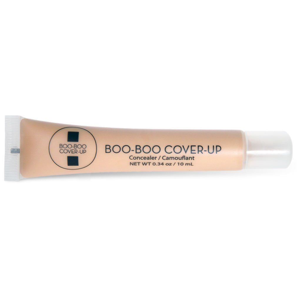 Boo-Boo Cover-Up Correcteur Médium sur la bouteille, camoufle les imperfections et nourrit la peau.