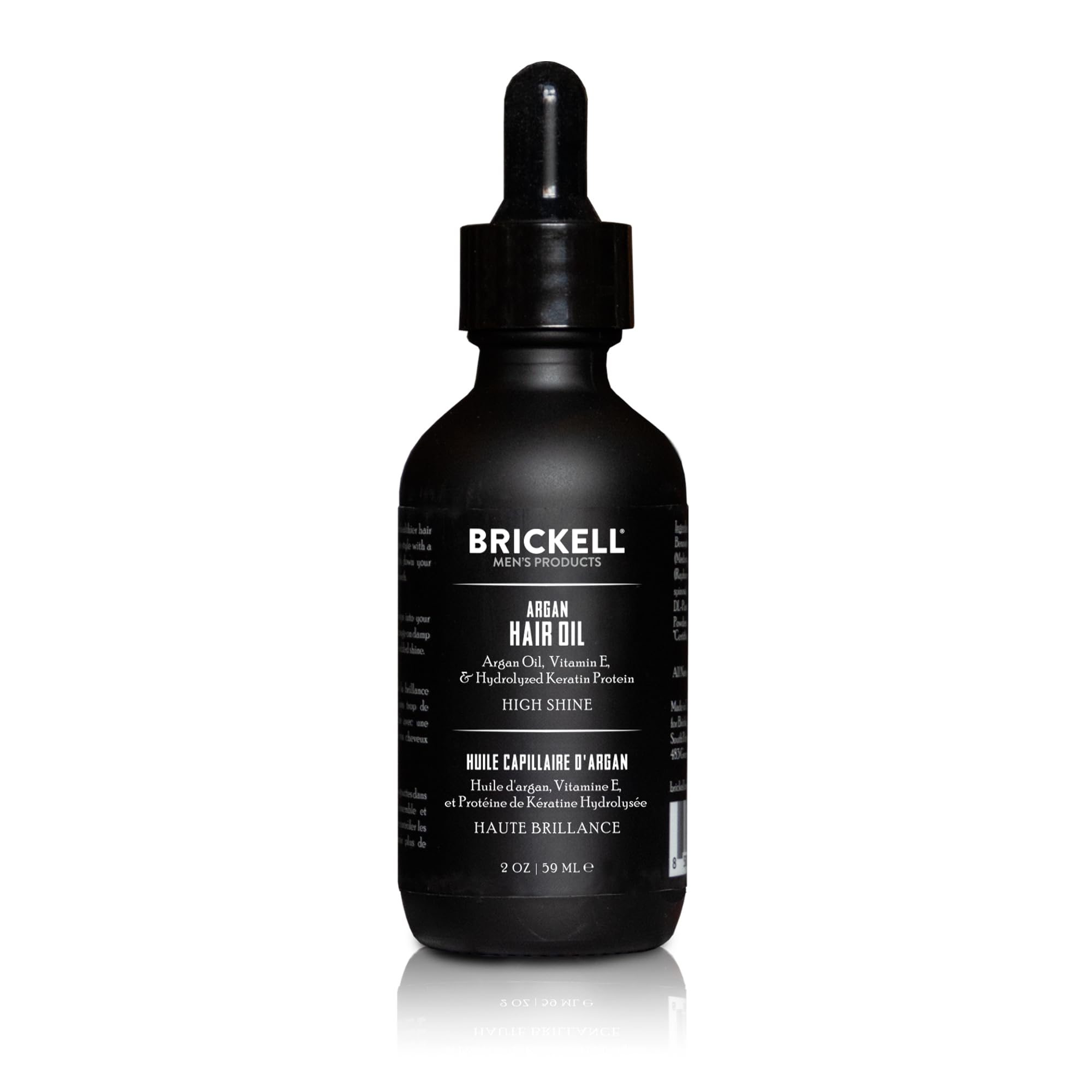 Brickell Huile d'Argan — bouteille visible, cheveux hydratés et brillants.