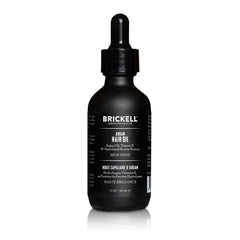Brickell Huile d'Argan — bouteille visible, cheveux hydratés et brillants.