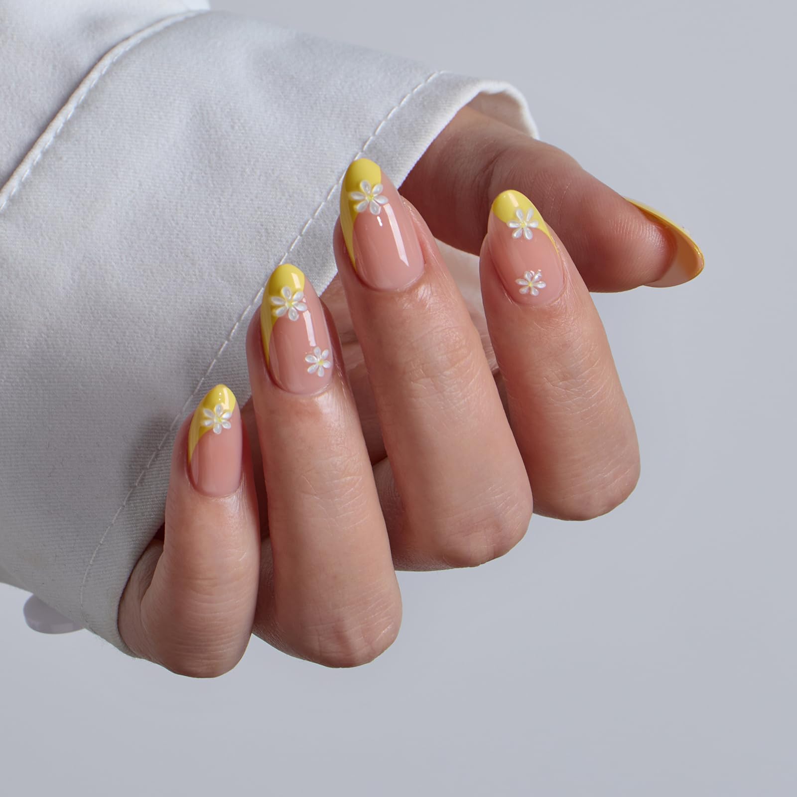 BTArtbox Daisy almond nails closeup with natural, seamless look.