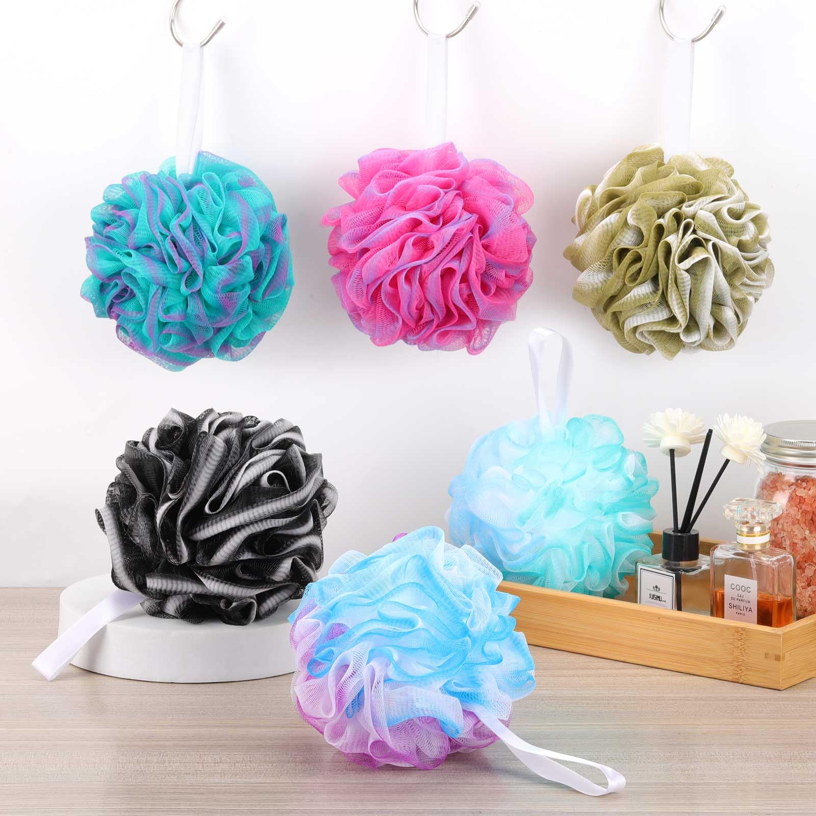 BTYMS éponge loofah – emballage sous vide, retrouve sa forme après utilisation.