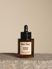 Bur Bur: bouteille huile cheveux Saison de Croissance offrant brillance et douceur