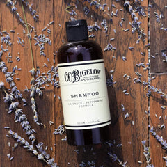 C.O. Bigelow Lavender Peppermint Shampoo label close-up highlights sulfate-free formula.