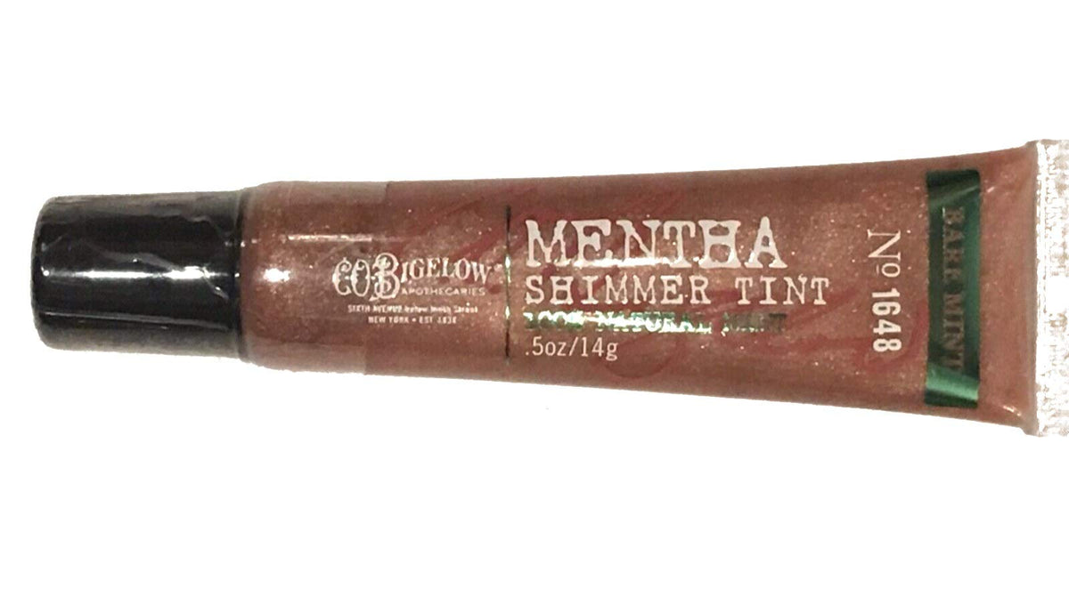Gloss à lèvres C. O. Bigelow Mentha Shimmer sur emballage élégant pour usage quotidien.