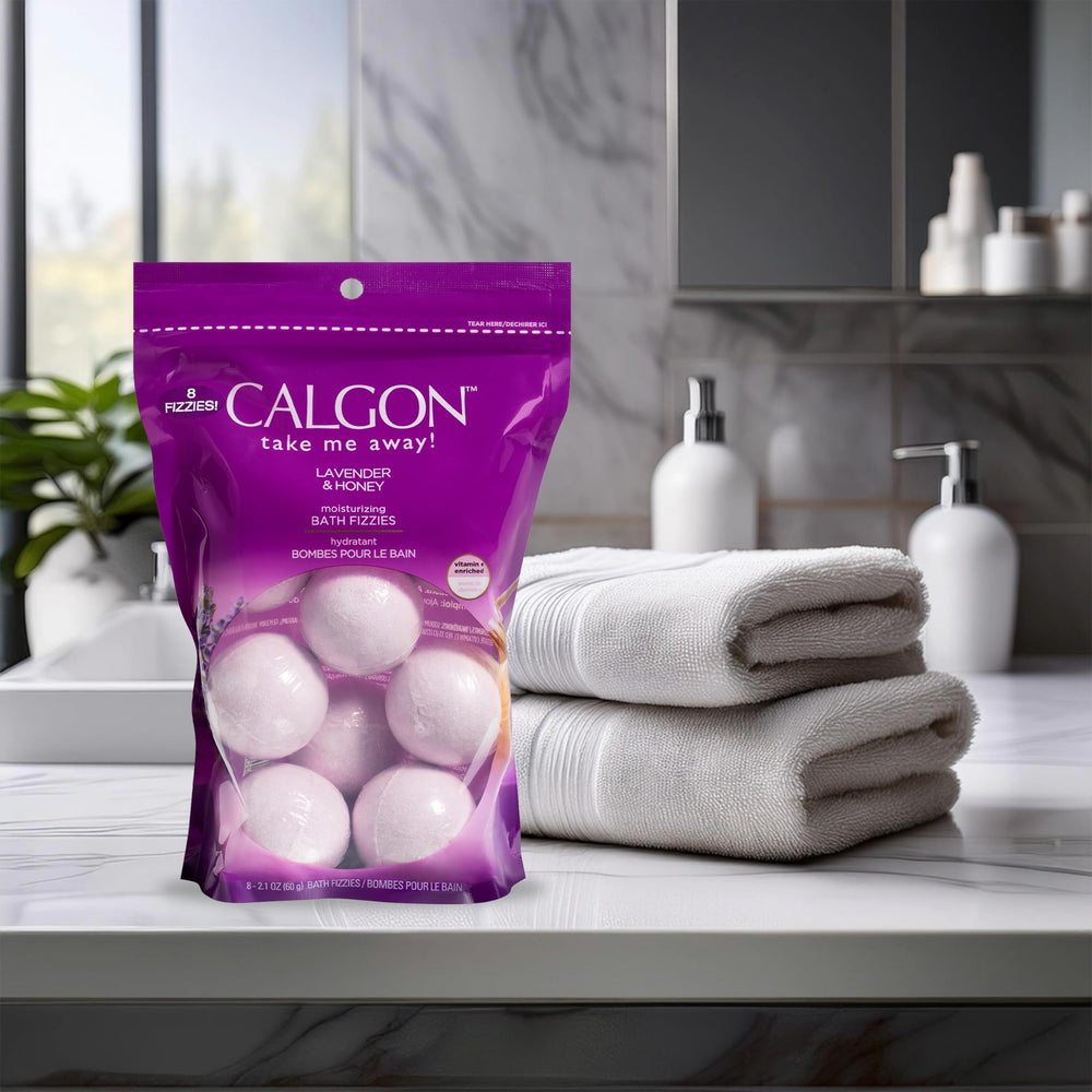 Calgon Lavande Miel, fragrance jasmin-rose-musc, ambiance spa à domicile.