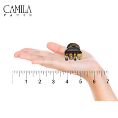 Clip cheveux tortue mini Camila Paris, idéal pour une coiffure chic et durable.