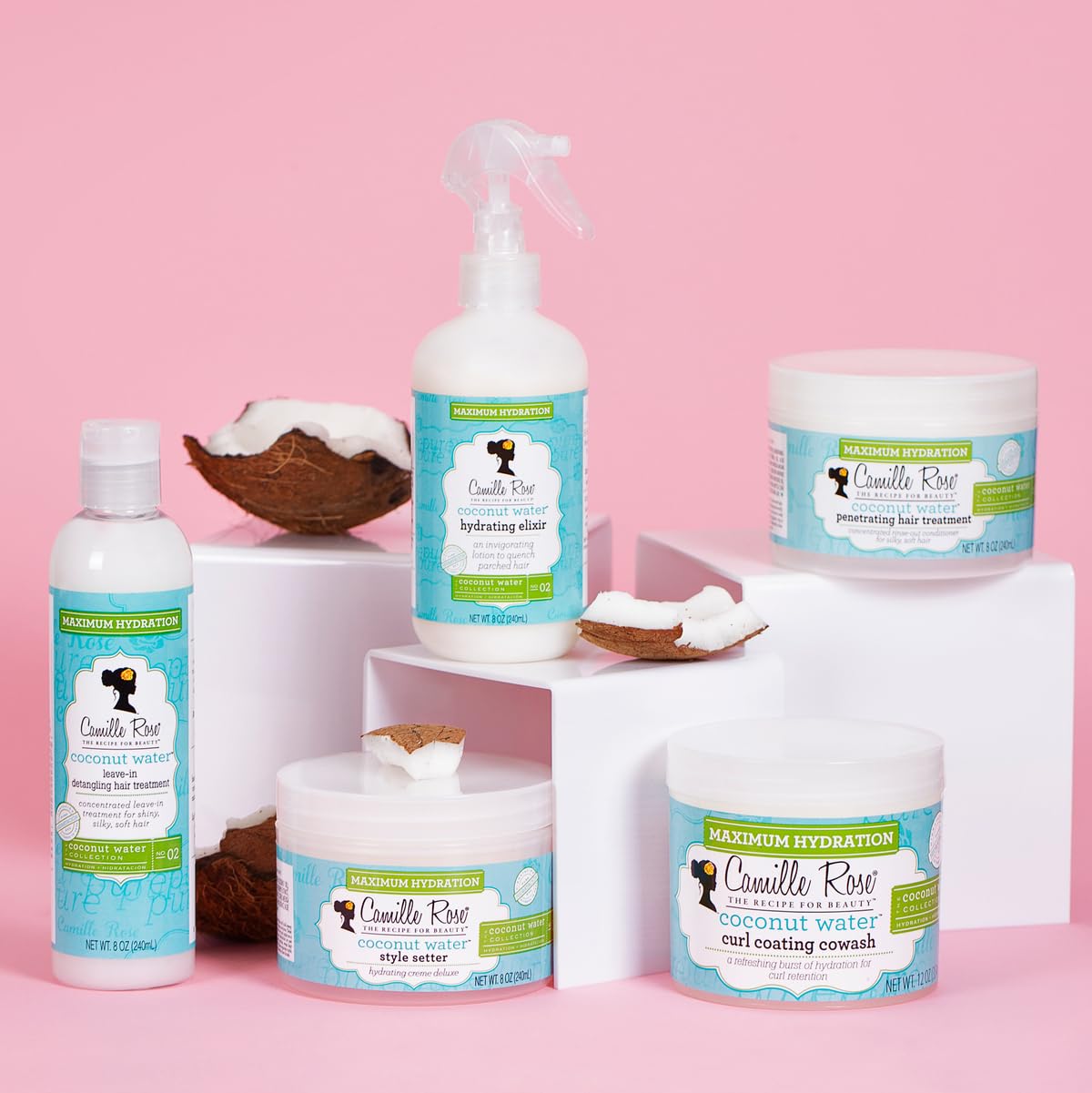 Application du conditionneur après shampoing sur cheveux bouclés.