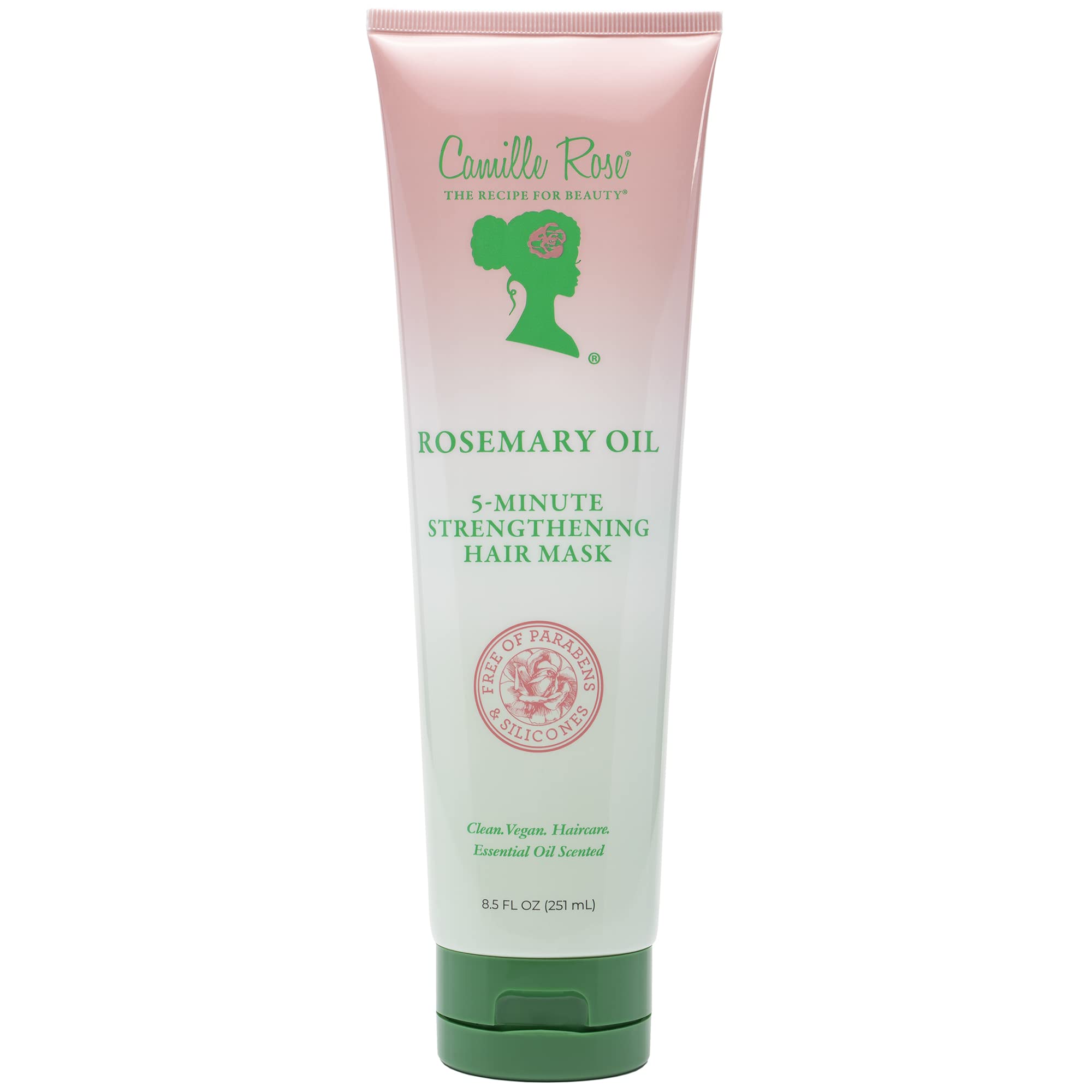Masque fortifiant Camille Rose au romarin sur cheveux humides pour soutenir la croissance potentielle.