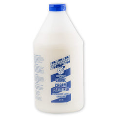Crème Campbell’s pré-mélangée dans une bouteille 64 oz pour un rasage rapide et fluide.