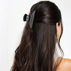 Pinces Canitor marbre blanc: texture douce et look élégant.