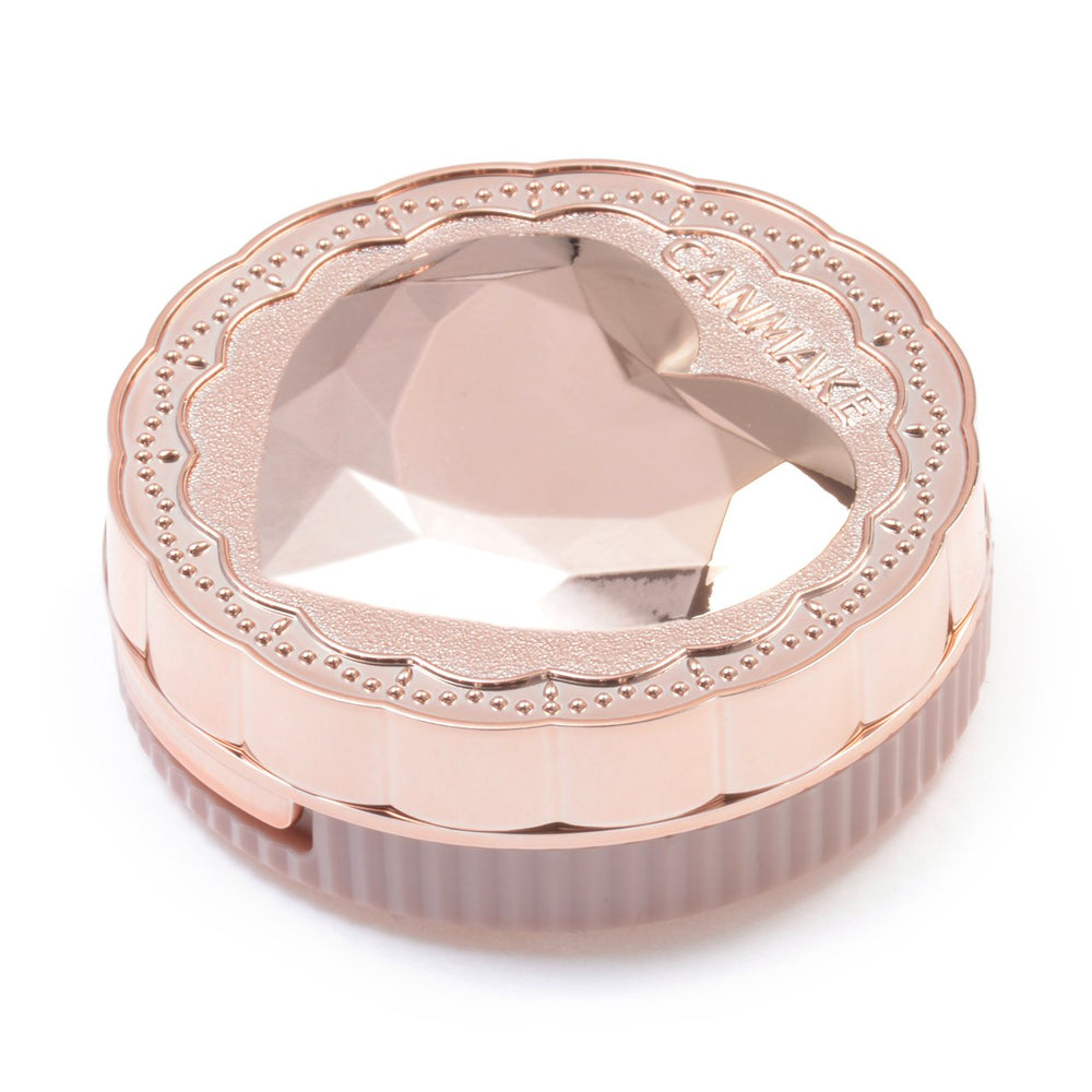 CANMAKE Secret Beauty Powder applicateur doux, application précise et confortable.