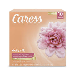 Caress Daily Silk barre beauté en douche, mousse douce et parfum pêche blanche.
