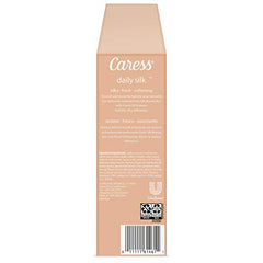 Parfum Caress Daily Silk pêche blanche et fleurs d’oranger sur la peau.