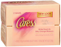 Caress Daily Silk Beauty Bars – mousse crémeuse pour peau douce et parfum léger après lavage.