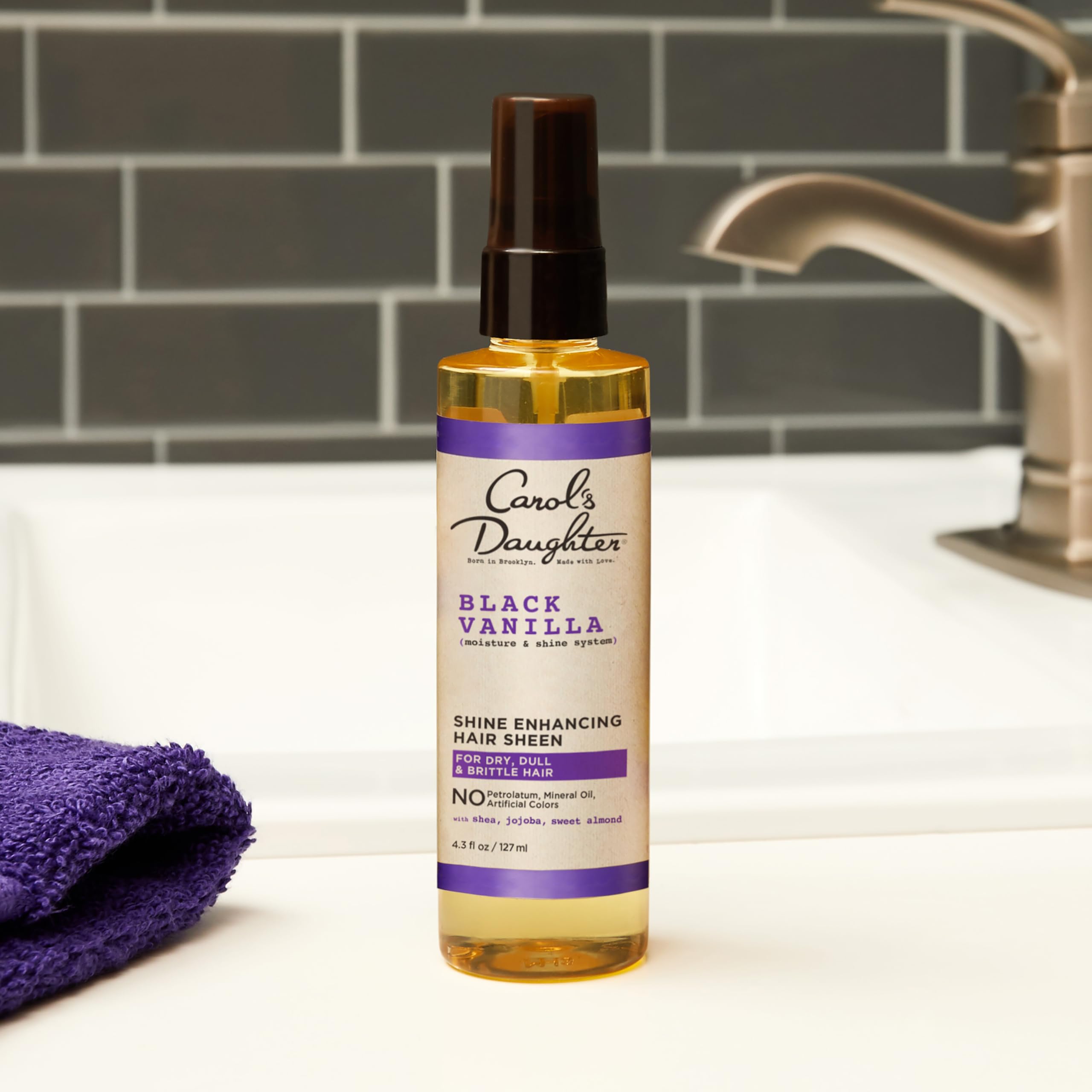 Carol's Daughter Black Vanilla Hair Sheen — emballage pouvant varier.