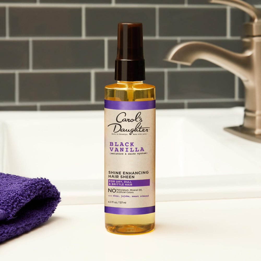 Carol's Daughter Black Vanilla Hair Sheen — emballage pouvant varier.