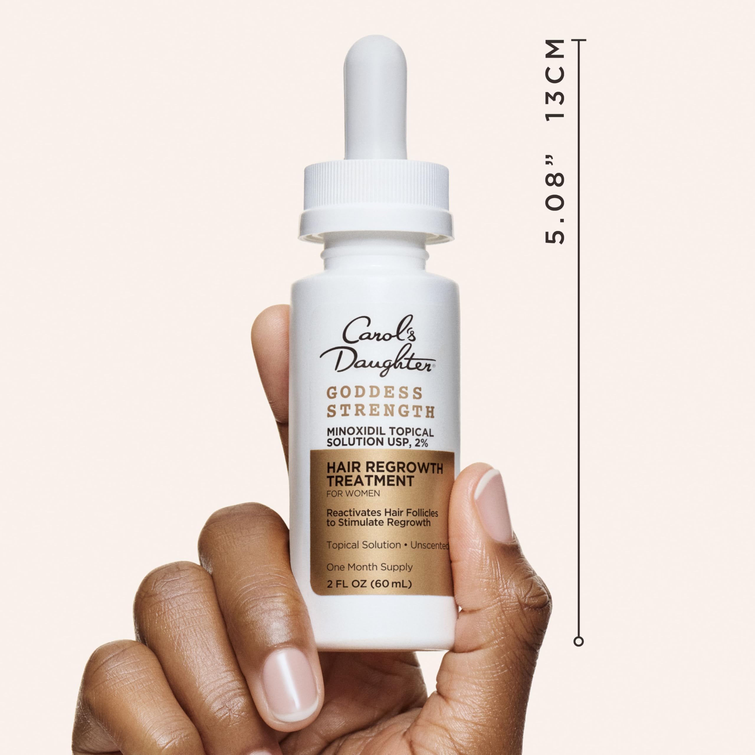 Carol's Daughter – emballage clair avec Minoxidil 2%, guide d'utilisation pratique.