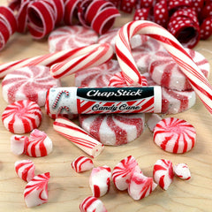 Close-up of ChapStick Candy Cane mint, soothing lips ready.