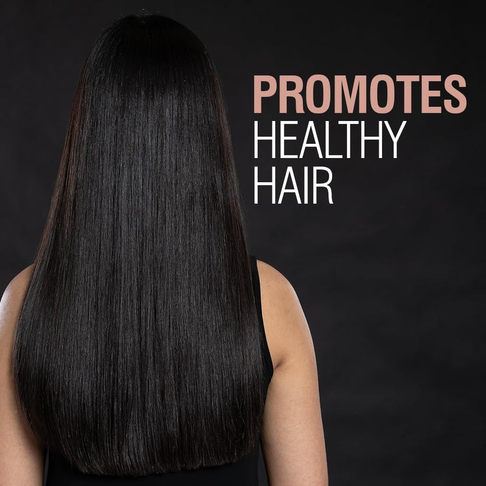 Application CHI sur cheveux humides pour des boucles bien définies.