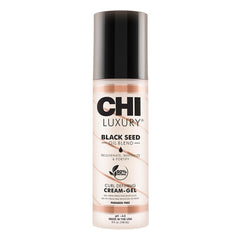 Bouteille CHI Crème Définissante Boucles, brillance et contrôle du frisottis.