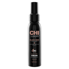 CHI crème-seche-nigelle-bouteille-pompe: soin léger pour brillance et anti-frisottis.