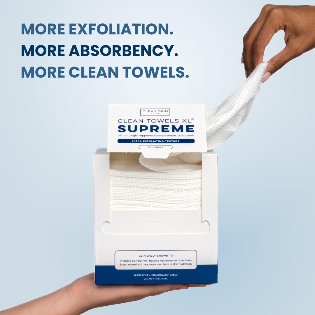 CLEAN SKIN CLUB towel beside a phone for size and scale comparison
