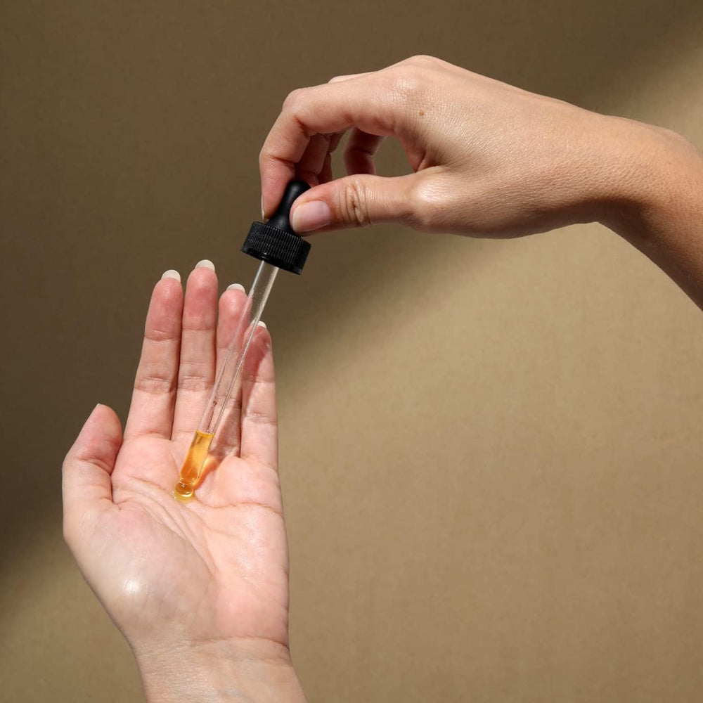 Cliganic huile de citrouille pour cheveux, appliquez sur les longueurs pour nourrir sans alourdir.