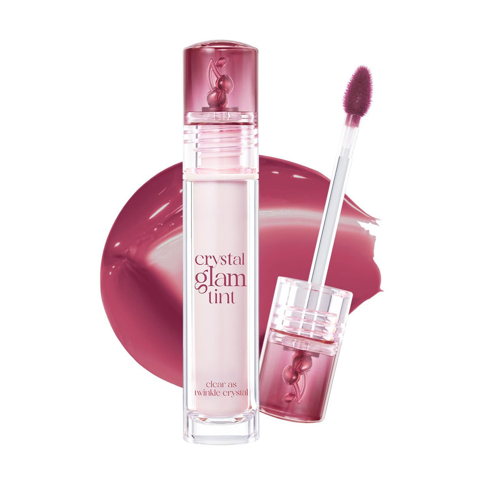 CLIO Crystal Glam Tint, bouteille brillante, fini gloss lumineux sur les lèvres.
