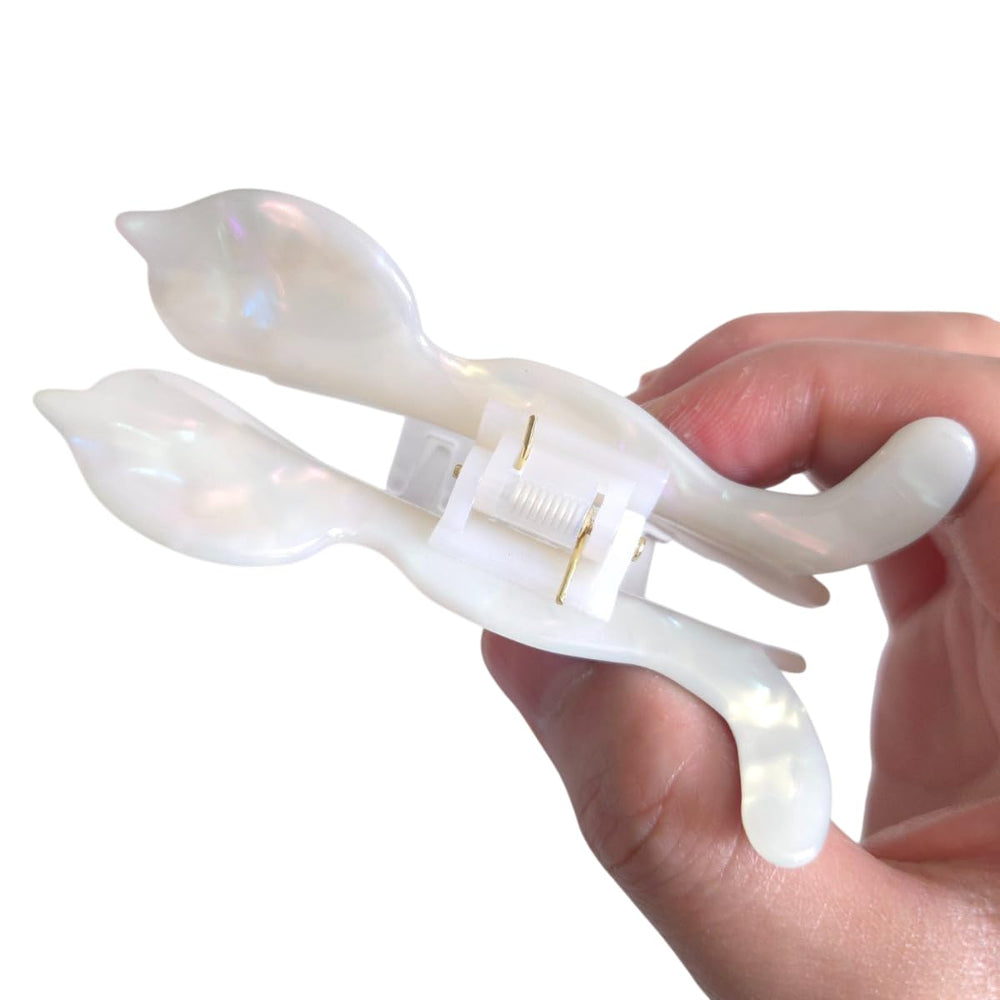 Clip Sugar chat design idéal pour maquillage et coiffage rapide.