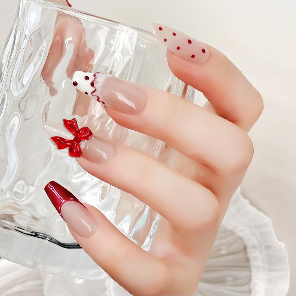 CnSybaris: Noeud-coeur rouge; un accent romantique durable sur vos ongles.