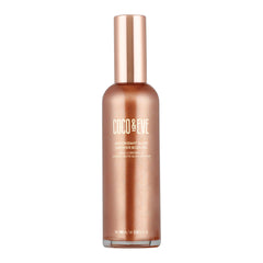 Coco & Eve huile-corps bouteille scintillante offrant un éclat immédiat sans gras